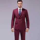 Men’s slim fit burgundy suit with double-breasted blazer and gold buttons, white shirt, blue tie