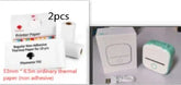 Compact thermal printer in white and green with box and USB cable, shown with thermal paper rolls.