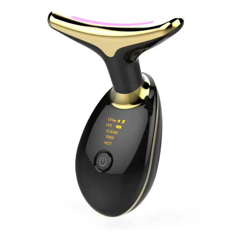 Black and gold electronic facial massager with LED display and curved top, modern design