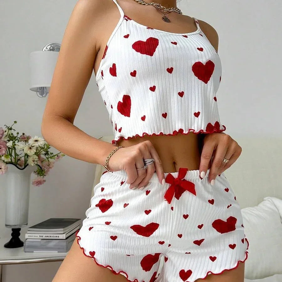 White ribbed crop top and shorts pajama set with red heart print and red bow, relaxed fit