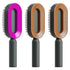 Three modern oval hairbrushes with colorful frames and black ergonomic handles