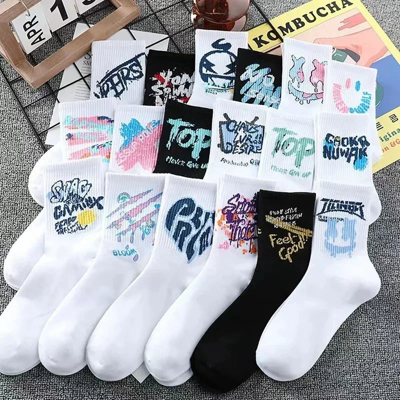 Colorful graphic cotton streetwear socks in white and black, regular fit, laid out on display.