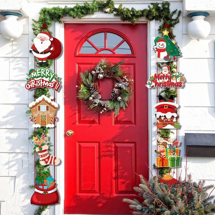 Red front door with Christmas wreath, pine garlands, and festive holiday decorations.