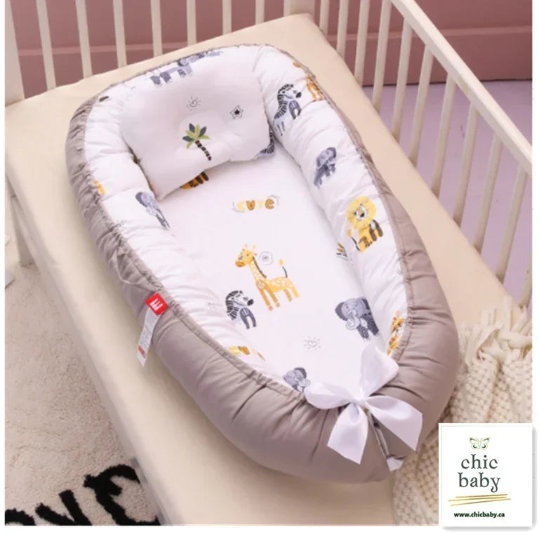 Neutral-tone baby nest with animal print, soft cotton material, fitted cushioned sides in crib