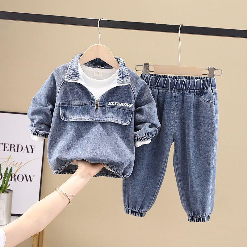 Kids' denim two-piece outfit with long sleeve zip-up top and elastic waist pants, relaxed fit.