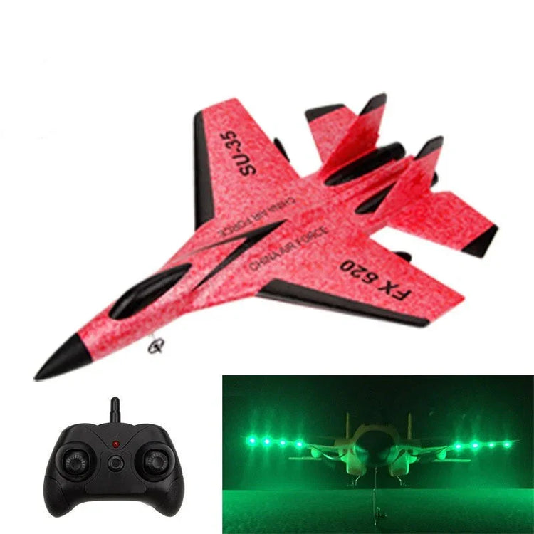 Red remote control foam jet airplane toy with black accents, shown with controller and green LED lights.
