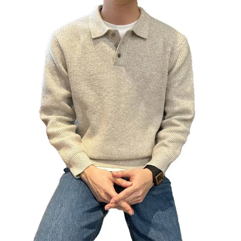 Beige ribbed knit polo sweater with relaxed fit, paired with blue jeans