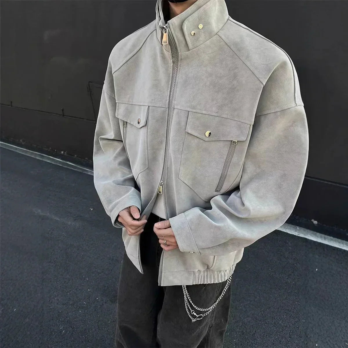 Oversized light gray suede jacket with front pockets and relaxed fit streetwear style