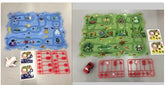 Two themed play mats with colorful race tracks, one blue with space design, one green with jungle animals, includes small toy vehicles and plastic accessories.