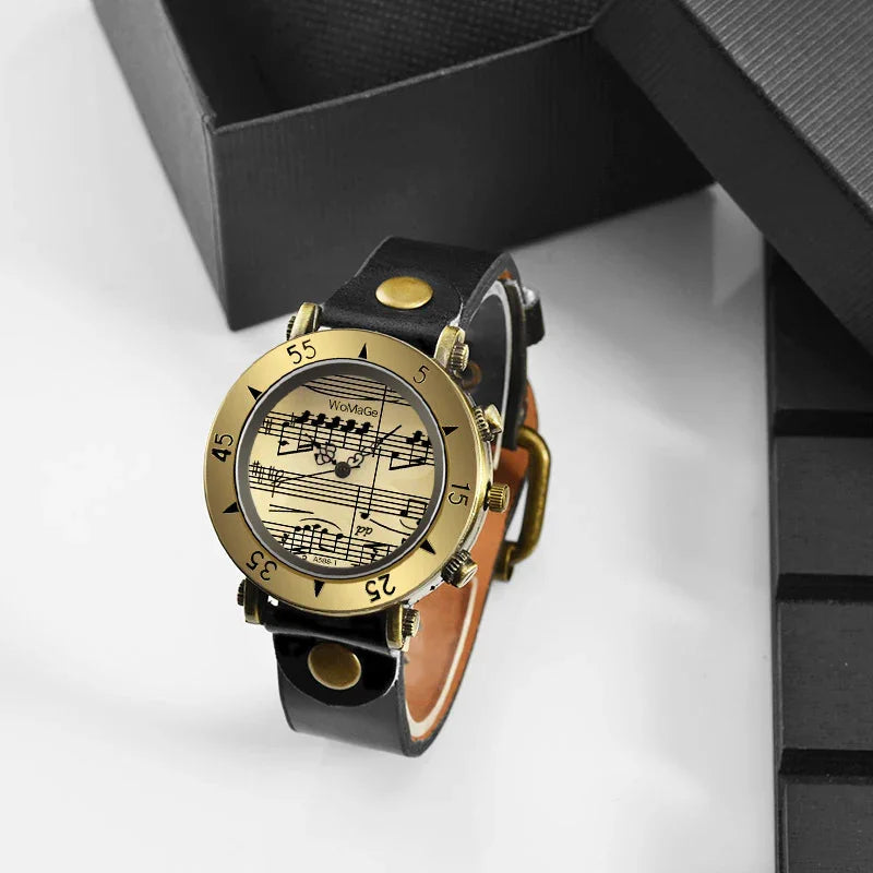 Black leather strap watch with gold case and musical note dial, modern streetwear accessory