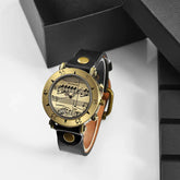 Vintage style wristwatch with gold bezel, black leather strap, and musical notes dial.