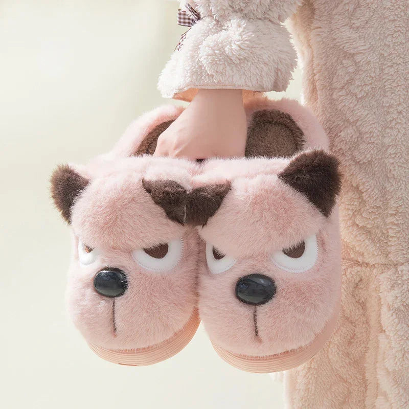 Pink plush slippers with cartoon dog face, fuzzy material, cozy relaxed fit.