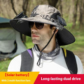 Man wearing wide-brim camo sun hat with built-in solar fans, outdoor gear, adjustable fit.