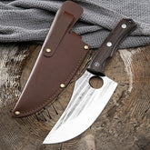 Stainless steel curved knife with dark wood handle and brown leather sheath on rustic wood