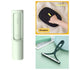 Minimalist lint remover, black mesh cleaning glove, and plastic scraper tool for clothing care