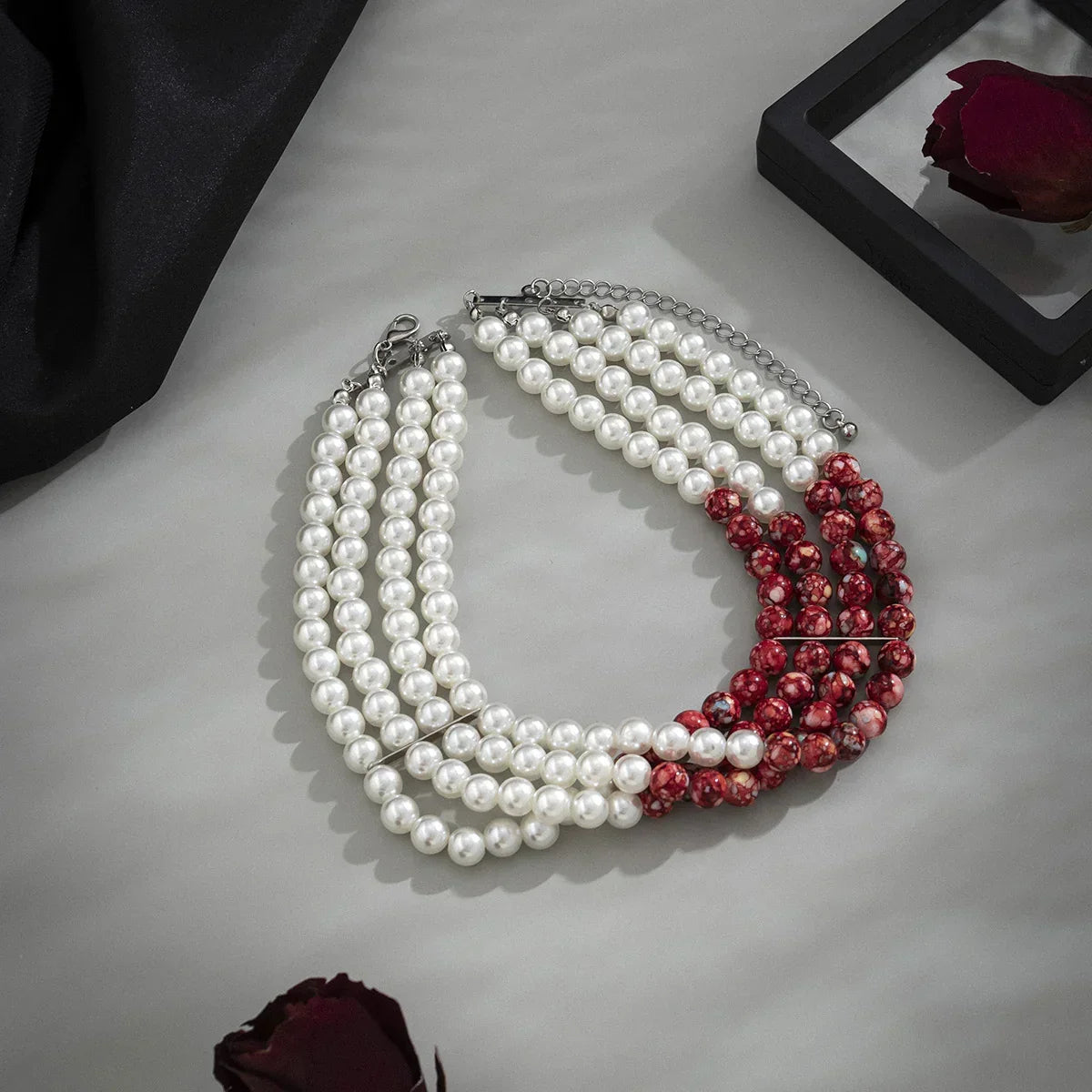 Multi-strand choker with white faux pearls and red marbled beads, modern bold jewelry
