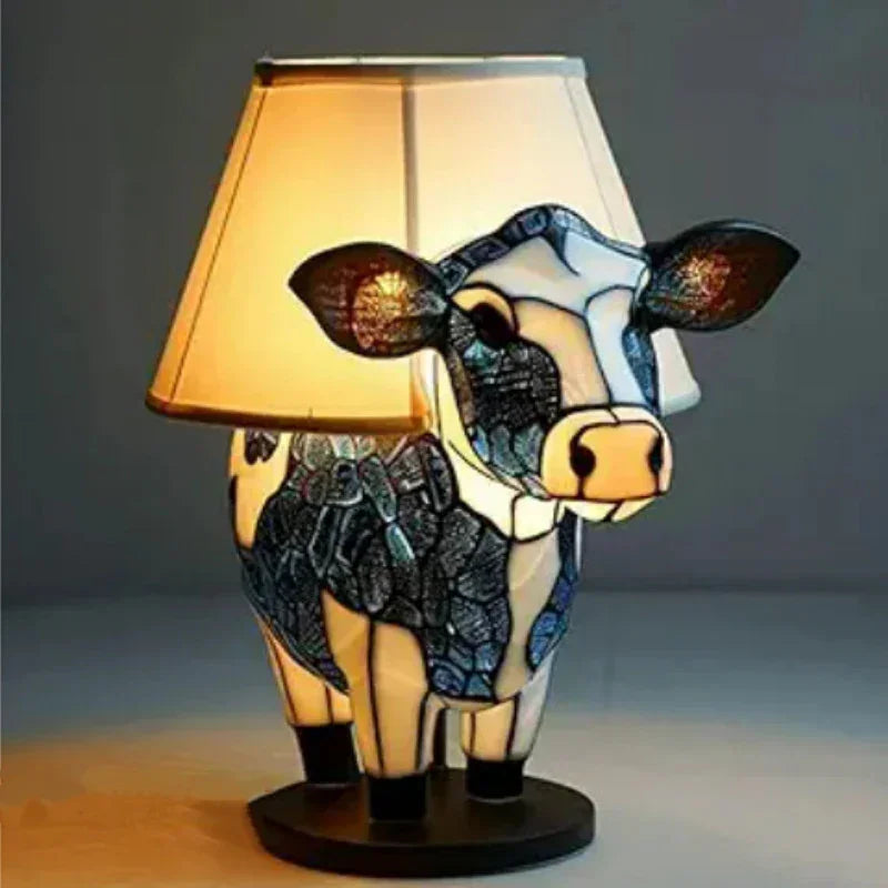 Cow-shaped decorative lamp with stained glass body and fabric lampshade