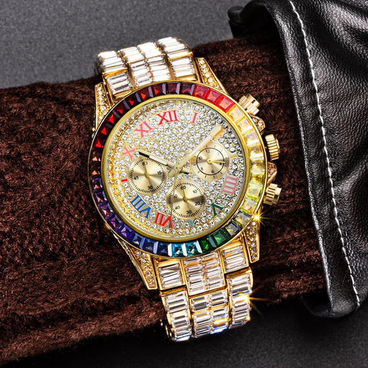 Gold luxury watch with multicolor crystal bezel, Roman numerals, and baguette link band