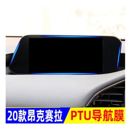 Car dashboard with a black rectangular screen, blue LED accents, and light interior.