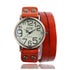 Vintage-style watch with large numerals, brown leather wrap strap, and metal rivet accents.