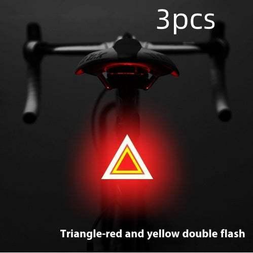 Bicycle seat with red and yellow triangular LED safety light, night cycling accessory