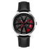 Futuristic black leather wristwatch with silver case, red accents, and unique dial design.