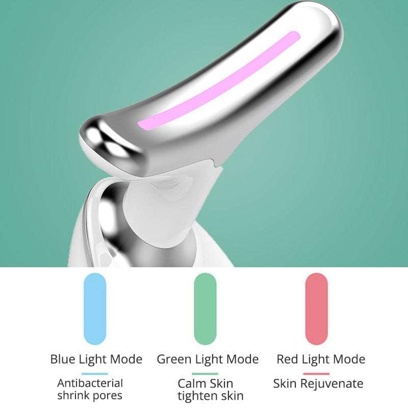 Silver and white LED facial massager showing light therapy modes for skin care