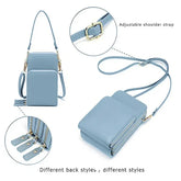 Light blue faux leather crossbody bag with adjustable shoulder strap and multiple zippered pockets.