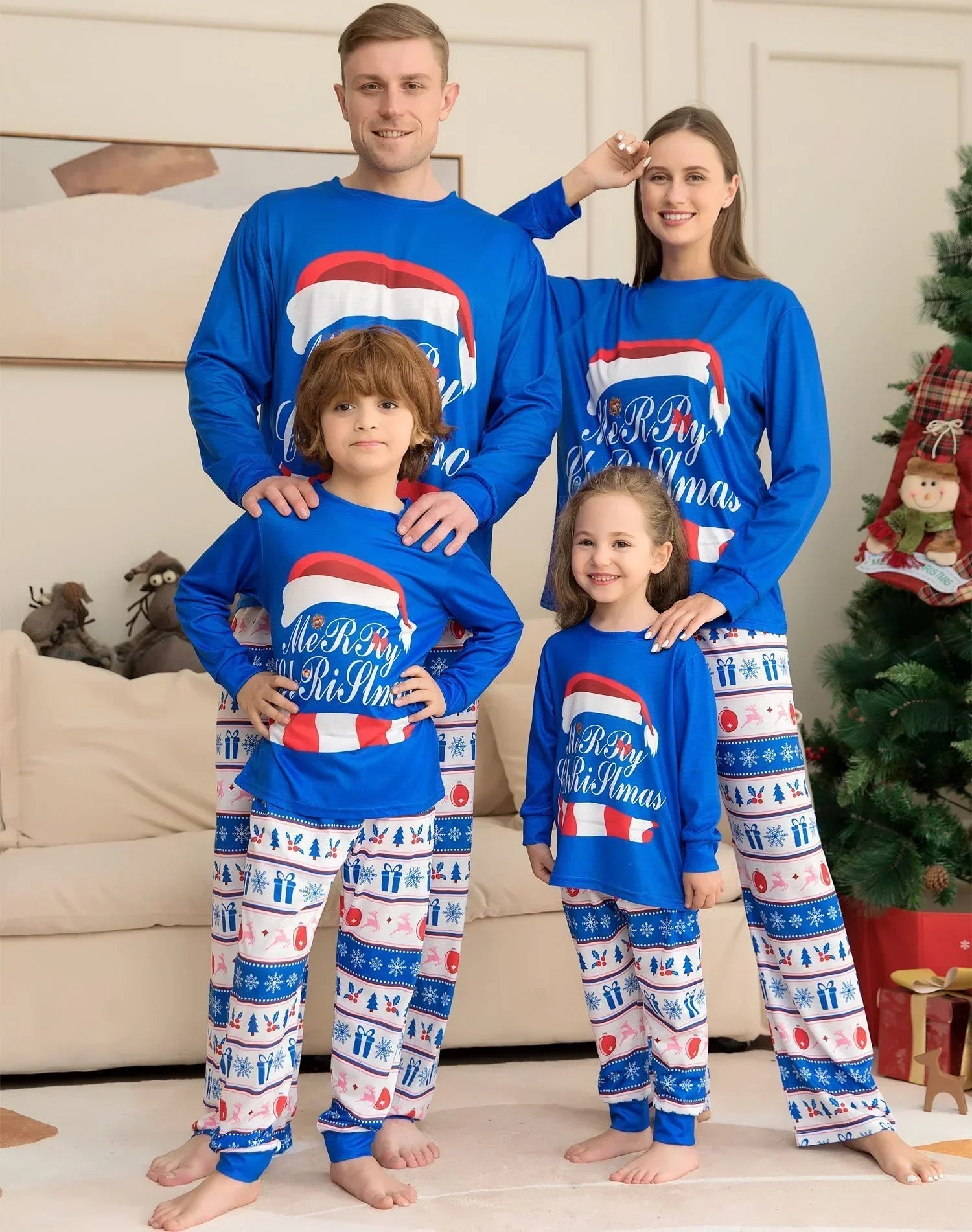 Family wearing matching blue and white Christmas pajamas with festive patterns and relaxed fit.