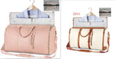 Travel duffel bags in pink and cream with brown straps, shown with garment compartments and an organizer pouch, made from smooth leather material, ideal for stylish streetwear travel.