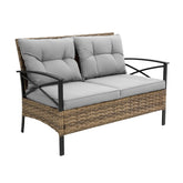 Modern outdoor loveseat with gray cushions, rattan wicker frame, and black metal arms.