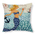 Decorative pillow with blue patterned mermaid design, nautical theme, and vintage accents