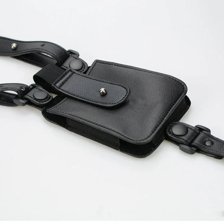 Black faux leather streetwear utility pouch with adjustable straps and metal snap closures