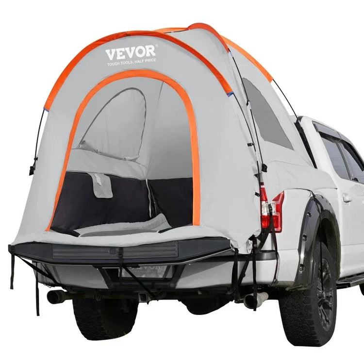 Gray and orange truck bed tent setup on white pickup, water-resistant polyester, relaxed fit for outdoor camping.