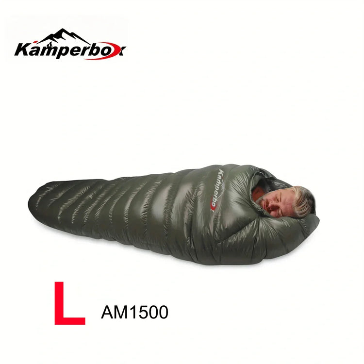 Man in a dark green, puffer-style mummy sleeping bag with insulated, snug fit