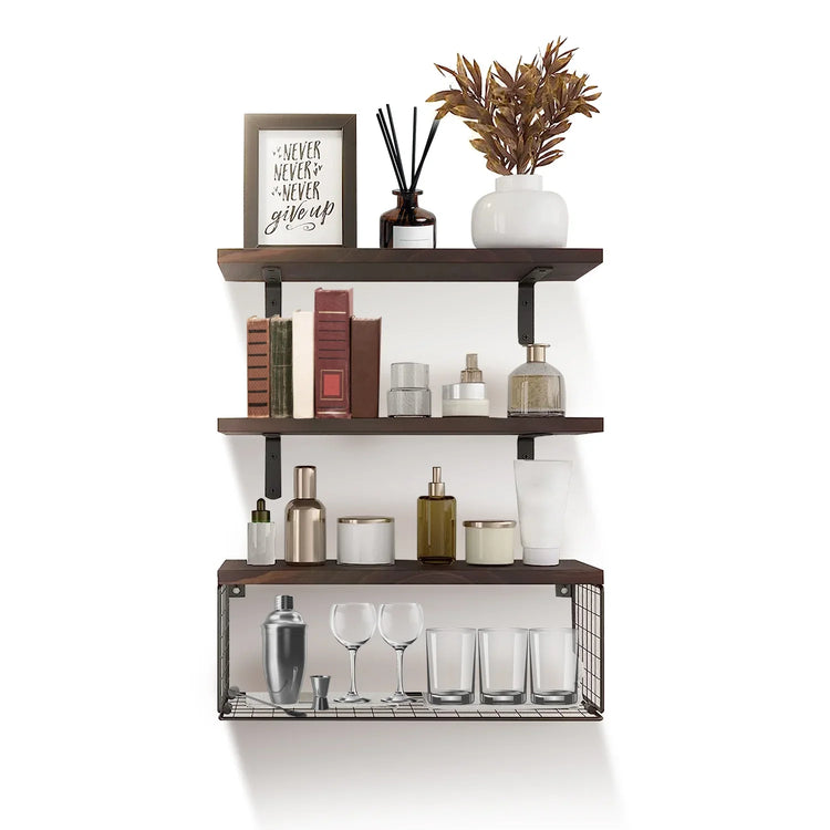 Wall-mounted dark wood shelves with decor, books, glassware, and storage bottles.