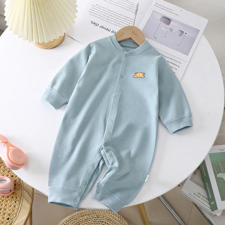 Light blue striped baby romper with snap buttons and long sleeves, soft cotton material, relaxed fit