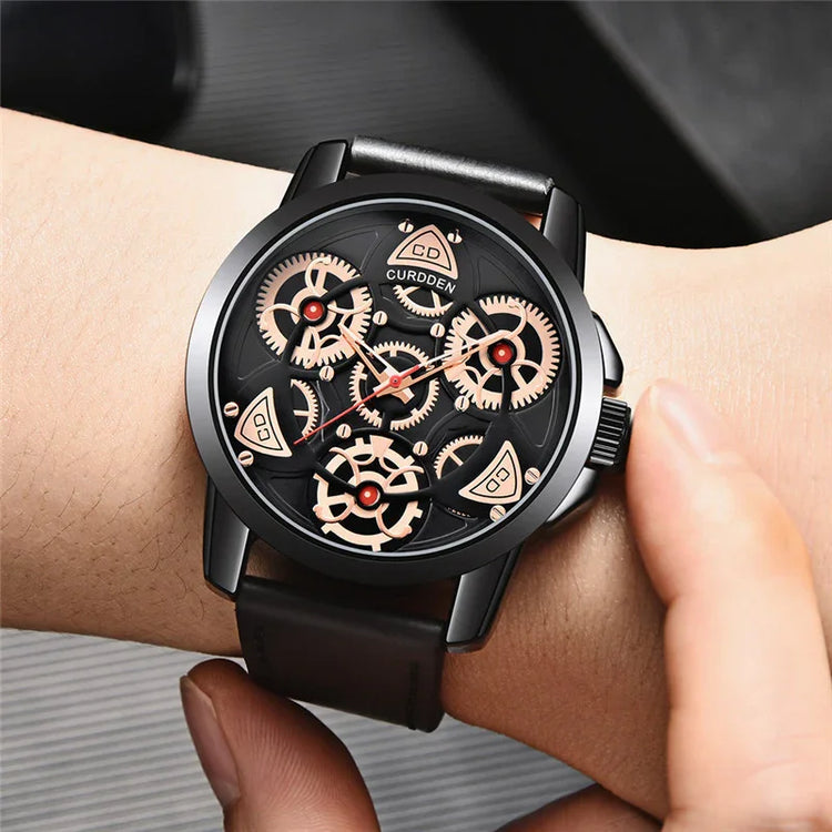 Black leather strap watch with exposed gold gears and modern skeleton dial design