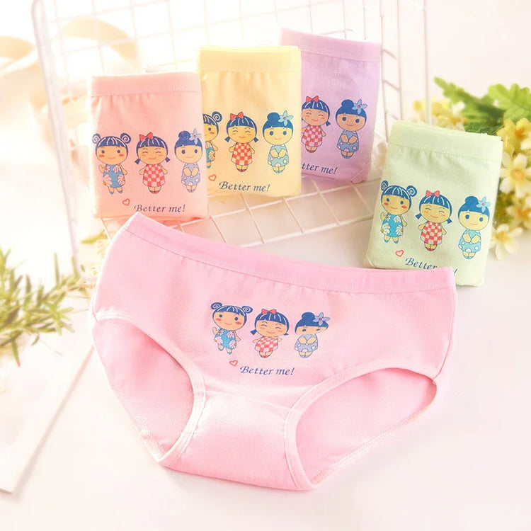 Colorful cotton girls underwear with cartoon print and soft, comfortable fit, displayed on a white surface.