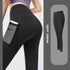 Black high-waisted stretch leggings with side pocket, slim fit activewear.