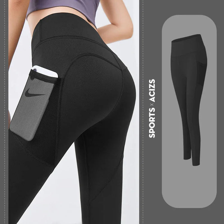 Black high-waisted stretch leggings with side pocket, slim fit activewear.