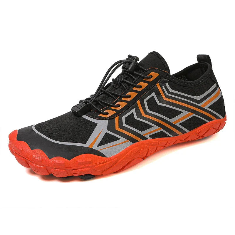 Black and orange lightweight sneaker with geometric patterns, mesh material, and slim fit
