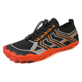 Black and orange lightweight sneaker with geometric patterns, mesh material, and slim fit