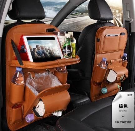 Brown leather car seat organizer with multiple pockets, cup holders, and tablet holder
