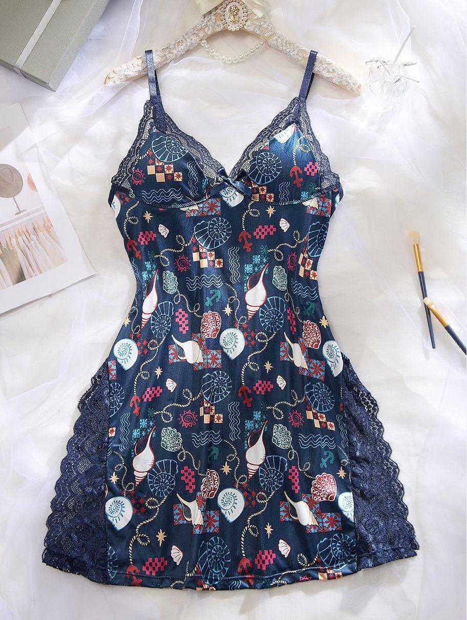 Navy blue satin slip dress with colorful abstract print, lace trim, and slim fit.