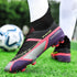 Black and purple mesh soccer cleats with red accents and sock-like fit on artificial grass