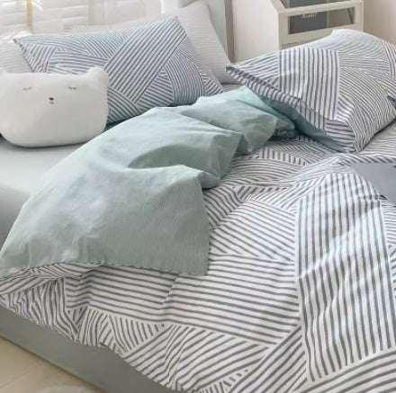 Striped grey and white bedding set with soft cotton material and relaxed, casual fit