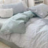 Cotton gradient color bed set with striped pillowcases and turquoise sheets