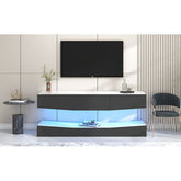 Grey particleboard hanging TV stand with LED lighting mounted on wall beneath a flat-screen TV in modern living room setting