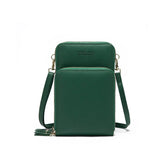 Green faux leather crossbody bag with dual zip compartments and adjustable strap, modern fit
